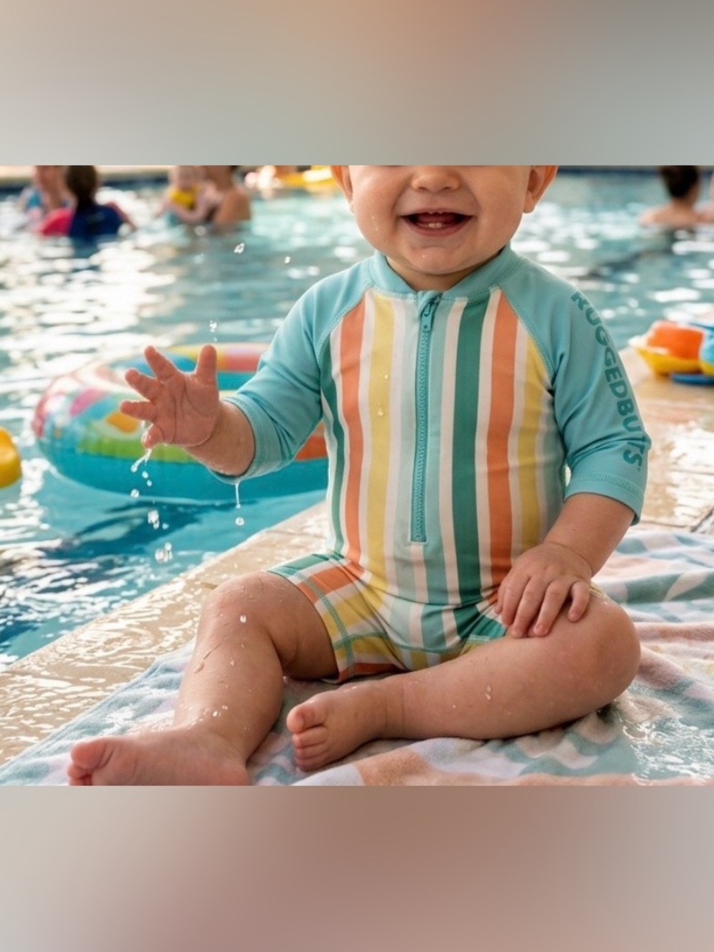 Rugged Butts Kids Front-Zip Rashguard Sunsuit in Aqua with Multi Stripes